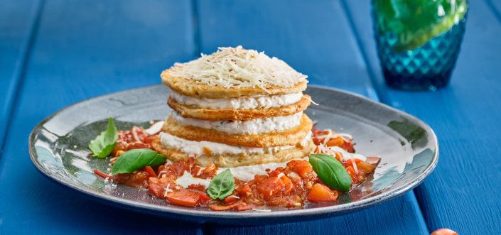 AVIKO Potato pancakes - a cake with curd mousse and tomato-garlic salsa