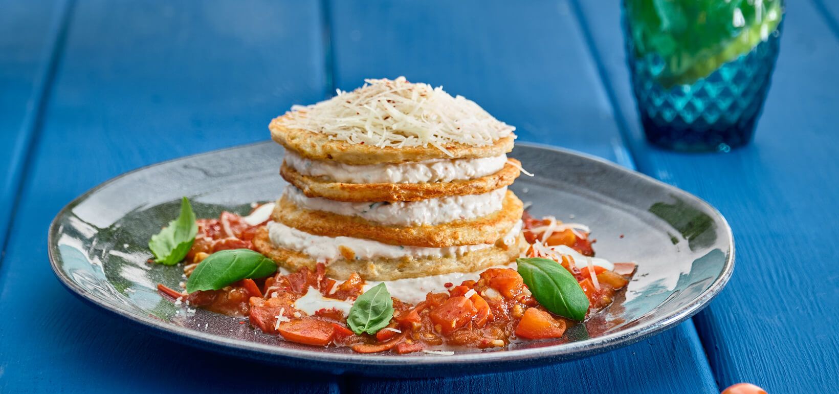 AVIKO Potato pancakes - a cake with curd mousse and tomato-garlic salsa