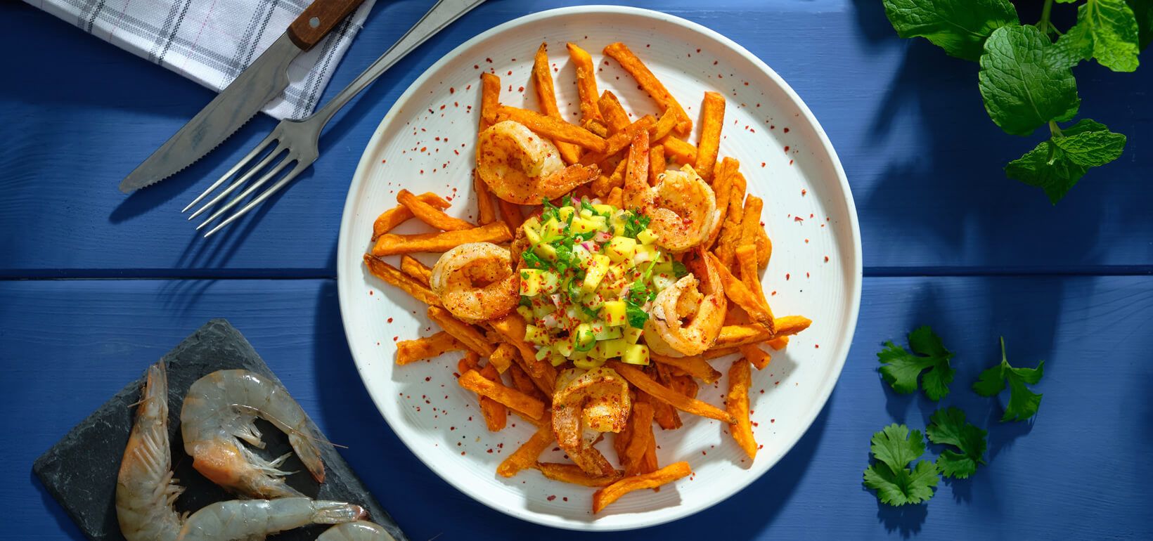 AVIKO Sweet potato fries with shrimp and mango-passion fruit-chilli salsa